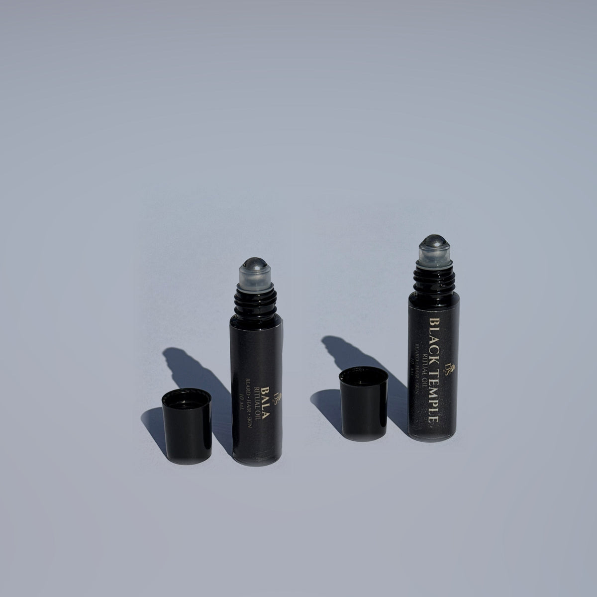 Evening Pair. Bala and Black Temple 10 mL Ritual Oil rollers.