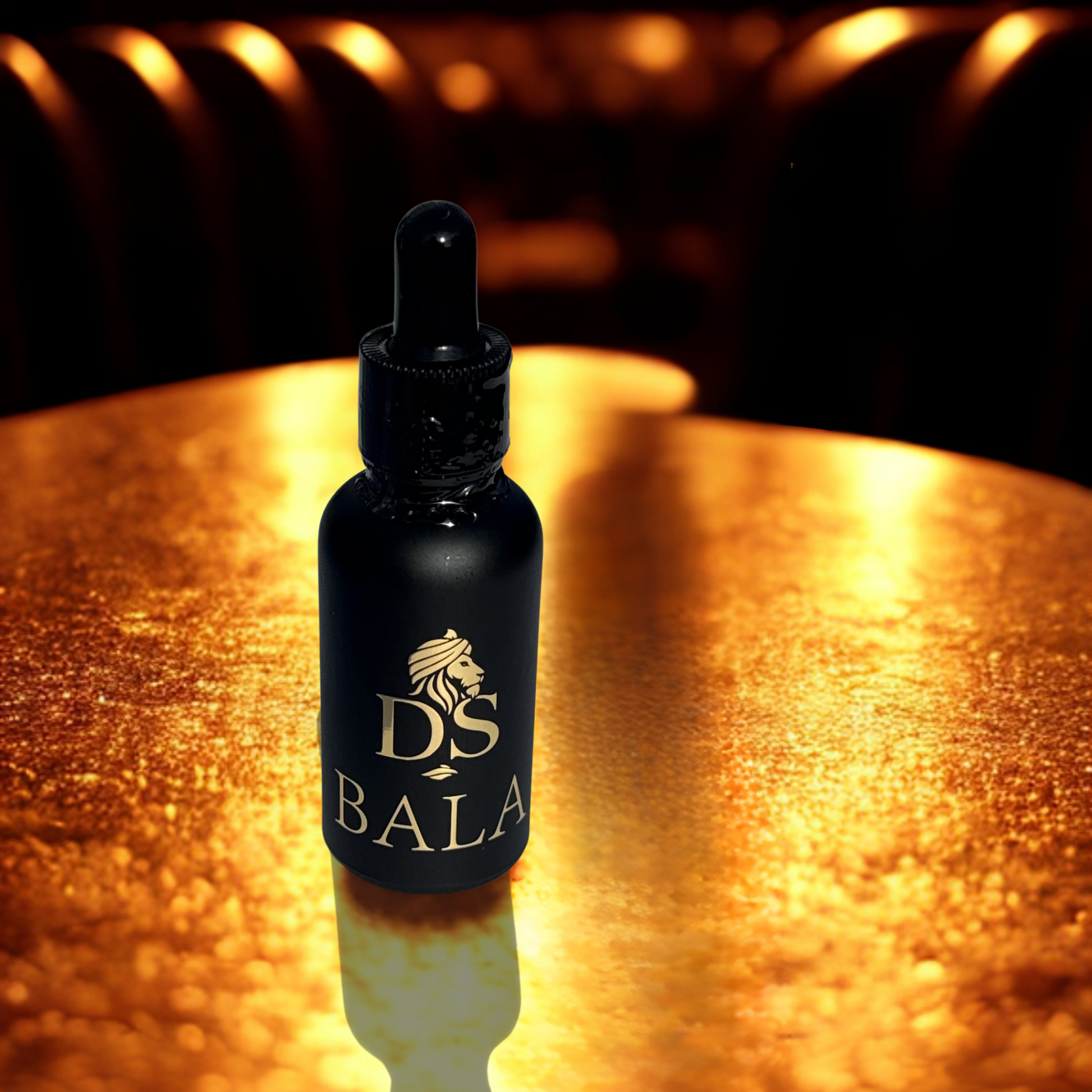Bottle of DS Bala on a reflective surface with warm lighting