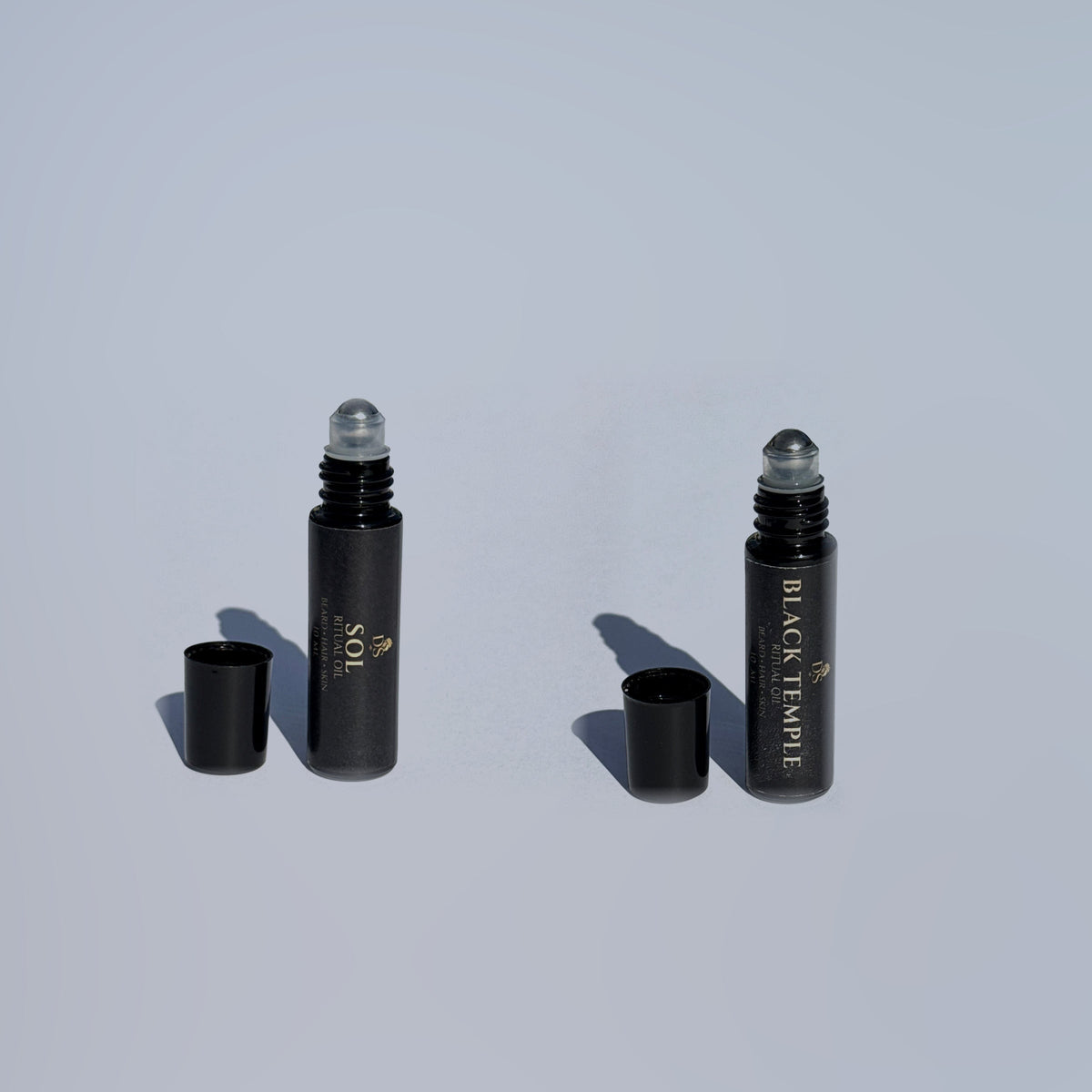 Warm Pair. Sol and Black Temple 10 mL Ritual Oil rollers.